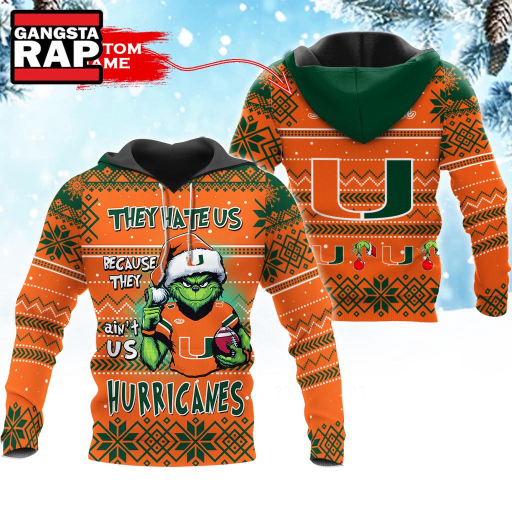 NCAA Miami Hurricanes They Hate US Special Grinch Snow Christmas Hoodie NCAA Miami Hurricanes They Hate US Special Grinch Snow Christmas Hoodie
