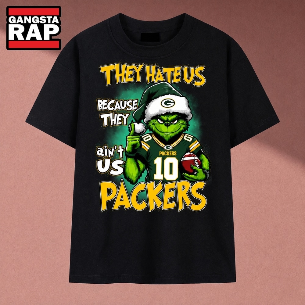 They Hate Us Because They Ain't Us Packers Grinch Christmas 2026 T Shirt, Music 2D Shirt They Hate Us Because They Ain't Us Packers Grinch Christmas 2026 T Shirt, Music 2D Shirt